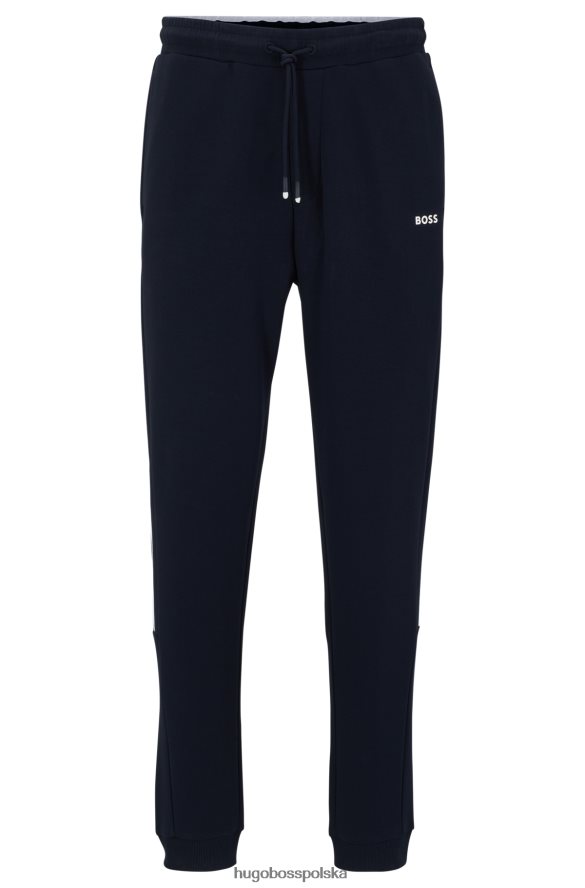 Hugo Boss ciemnoniebieskie spodnie dresowe z mieszanki bawełny z nadrukami w paski i logo hugo ciemny niebieski R0X0H64448