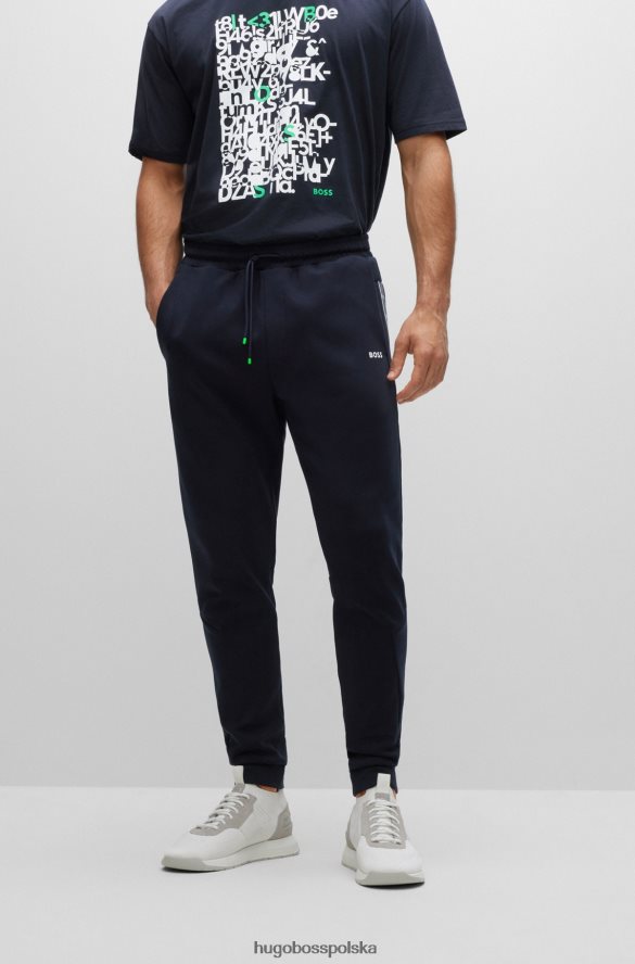 Hugo Boss ciemnoniebieskie spodnie dresowe z mieszanki bawełny ze wstawkami z logo hugo ciemny niebieski R0X0H61284