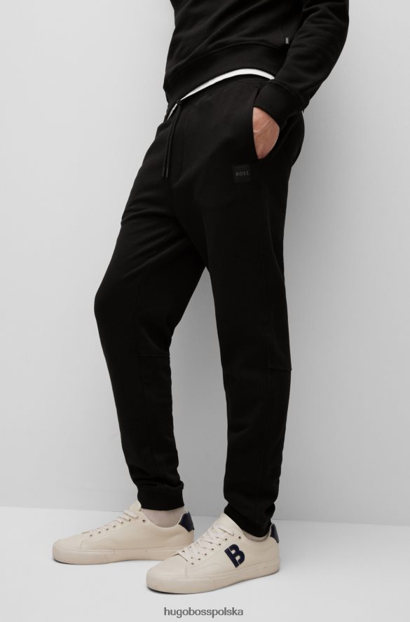 Hugo Boss czarne spodnie dresowe z bawełny frotte z naszywką z logo hugo czarny R0X0H61440