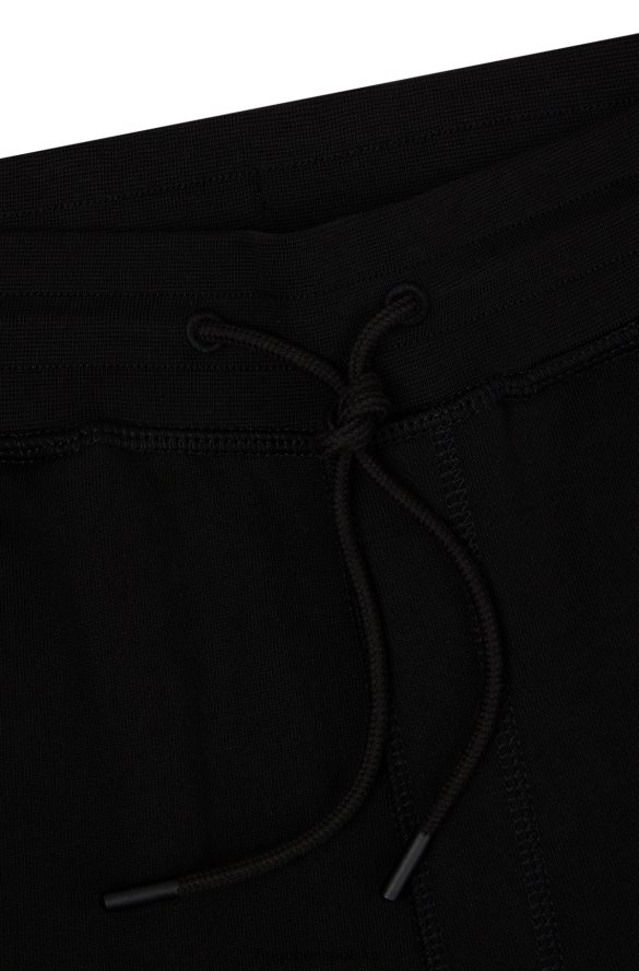 Hugo Boss czarne spodnie dresowe z bawełny frotte z naszywką z logo hugo czarny R0X0H61440