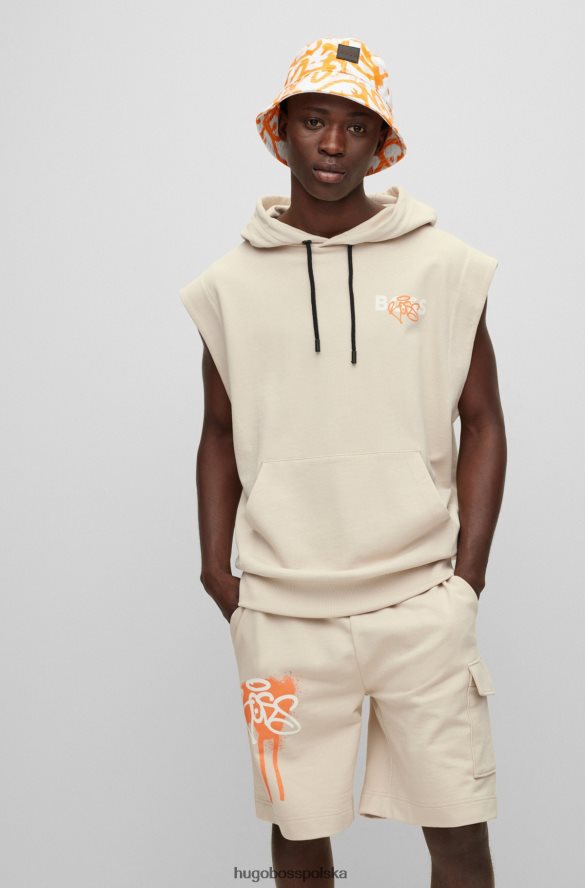Hugo Boss hugo bawełniana bluza z kapturem bez rękawów o swobodnym kroju z grafiką z graffiti w kolorze jasnobeżowym jasny beż R0X0H62705