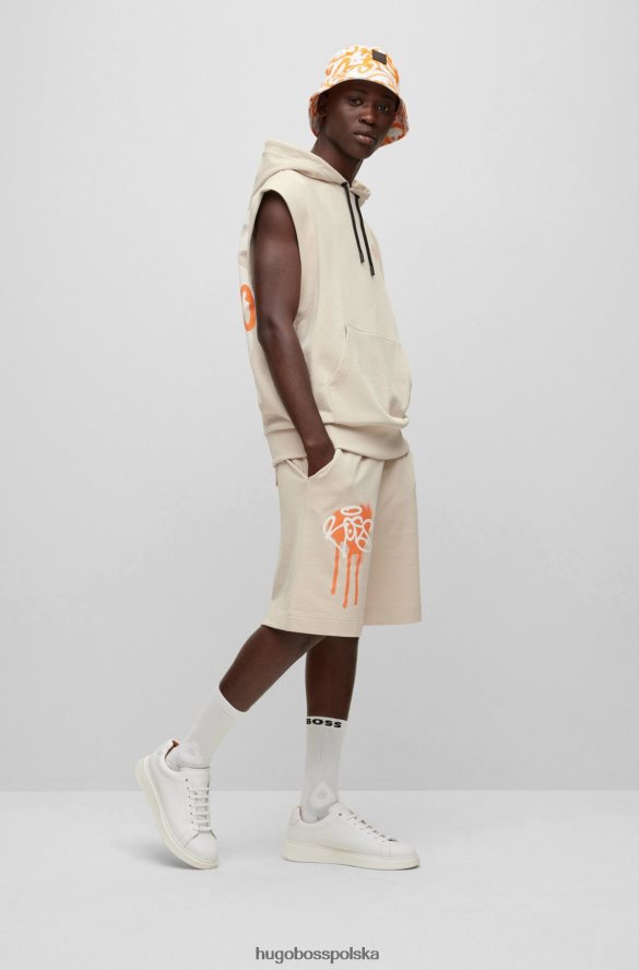 Hugo Boss hugo bawełniana bluza z kapturem bez rękawów o swobodnym kroju z grafiką z graffiti w kolorze jasnobeżowym jasny beż R0X0H62705
