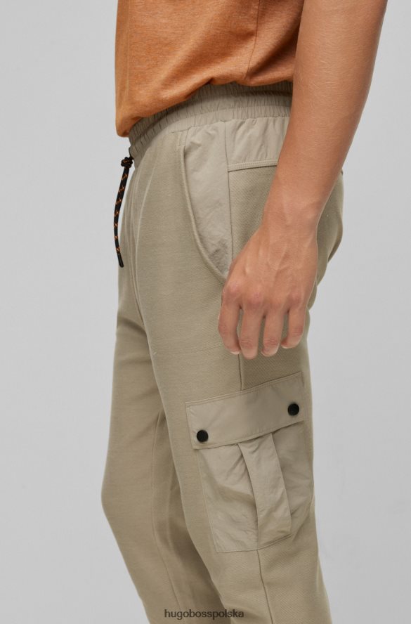 Hugo Boss jasnoszare spodnie dresowe hugo z bawełny frotte i naszywką z logo jasnoszary R0X0H64398