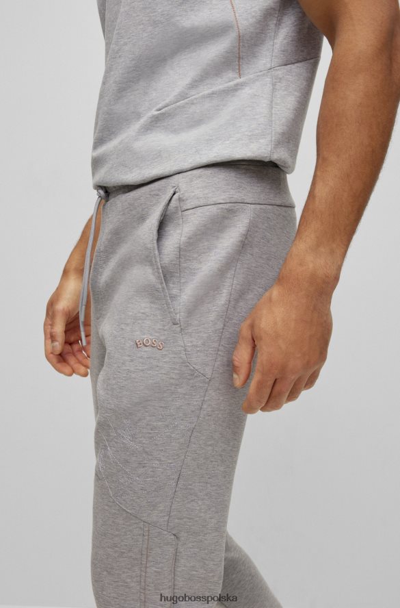 Hugo Boss jasnoszare spodnie dresowe z mieszanki bawełny z grafiką w kratkę hugo jasnoszary R0X0H61136