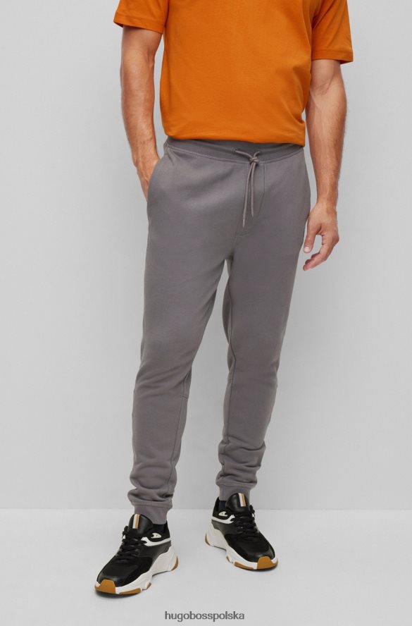 Hugo Boss szare spodnie dresowe z bawełny frotte z naszywką z logo hugo szary R0X0H61434