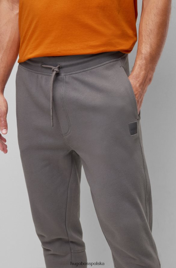 Hugo Boss szare spodnie dresowe z bawełny frotte z naszywką z logo hugo szary R0X0H61434