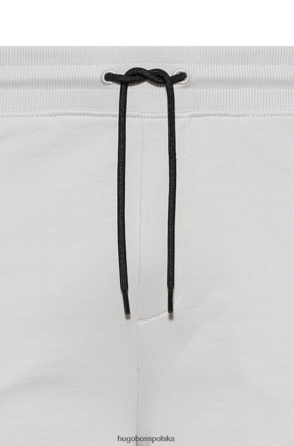 Hugo Boss szorty bawełniane frotte z czerwoną metką z logo w kolorze jasnobeżowym hugo jasny beż R0X0H63743