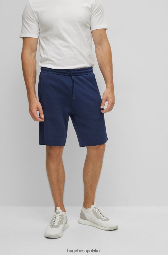 Hugo Boss szorty o regularnym kroju z różnych materiałów z zakrzywionym logo, ciemnoniebieskie hugo ciemny niebieski R0X0H62637