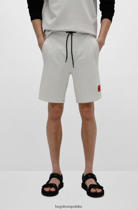 Hugo Boss szorty z bawełny frotte z czerwoną metką z logo hugo jasnobeżowy jasny beż R0X0H63497