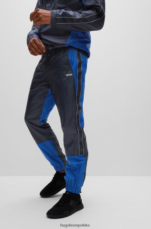 Hugo Boss wodoodporny dres z detalami z logo w kolorze ciemnoniebieskim hugo ciemny niebieski R0X0H64472