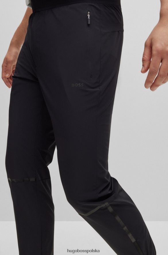 Hugo Boss Czarne, zwężane spodnie dresowe Hugo z ozdobnymi odblaskowymi detalami czarny R0X0H64337
