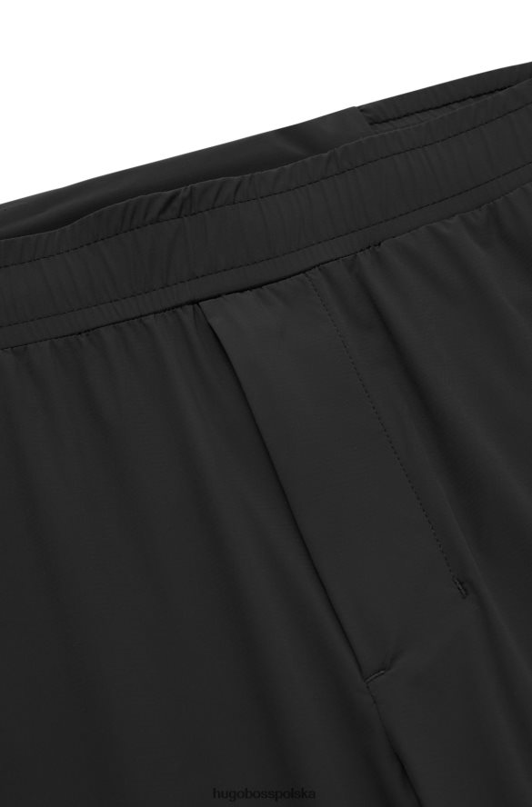 Hugo Boss Czarne, zwężane spodnie dresowe Hugo z ozdobnymi odblaskowymi detalami czarny R0X0H64337