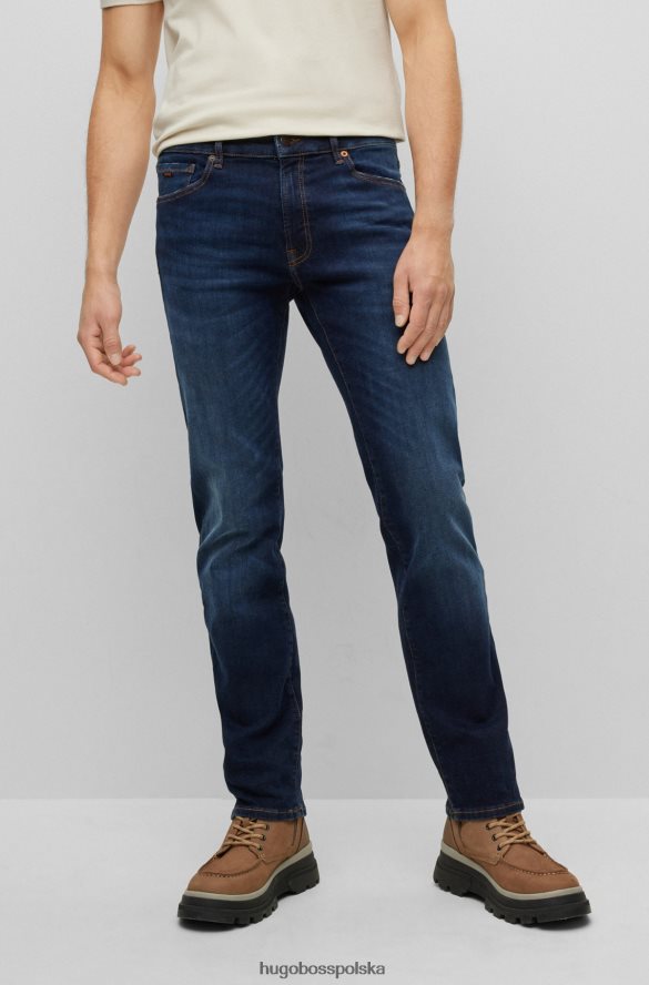 Hugo Boss ciemnoniebieskie dżinsy Hugo o dopasowanym kroju z marmurkowo-niebieskiego, wygodnego dżinsu ze stretchem ciemny niebieski R0X0H62004
