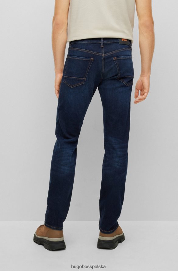 Hugo Boss ciemnoniebieskie dżinsy Hugo o dopasowanym kroju z marmurkowo-niebieskiego, wygodnego dżinsu ze stretchem ciemny niebieski R0X0H62004