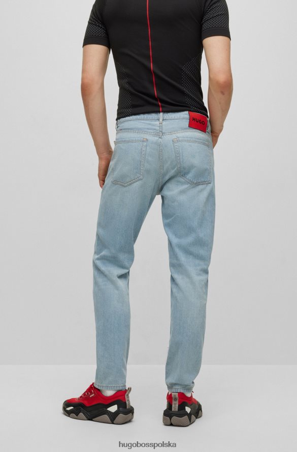 Hugo Boss jasnoniebieskie, zwężane jeansy hugo z niebieskiego denimu z przetarciami jasny niebieski R0X0H64229