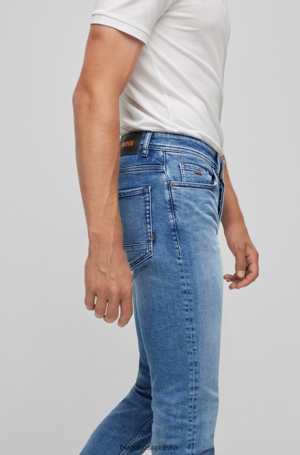 Hugo Boss niebieskie dżinsy hugo o zwężanym kroju z niebieskiego, wygodnego denimu ze streczem niebieski R0X0H61579