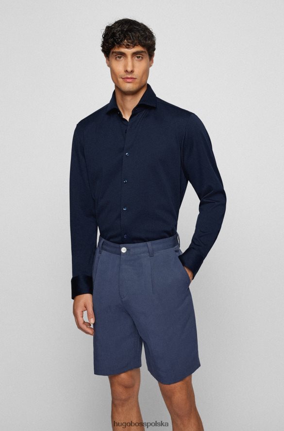 Hugo Boss ciemnoniebieska koszula Hugo o regularnym kroju, wykonana ze strukturalnego materiału superelastycznego ciemny niebieski R0X0H62378