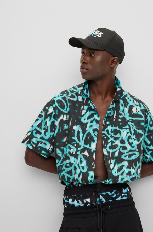Hugo Boss jasnoniebieska koszula o swobodnym kroju hugo z grafiką graffiti jasny niebieski R0X0H63221