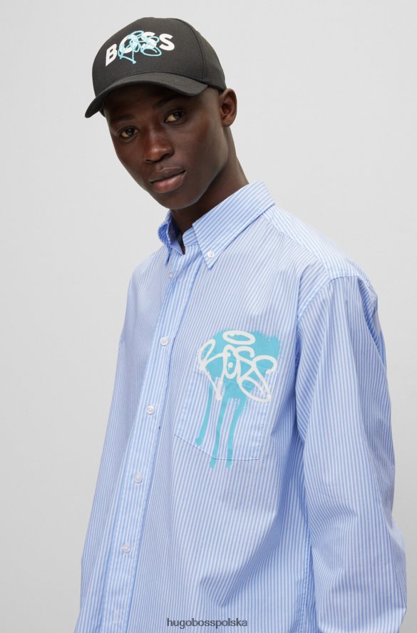 Hugo Boss jasnoniebieska koszula o swobodnym kroju z długim rękawem i grafiką graffiti hugo jasny niebieski R0X0H63578