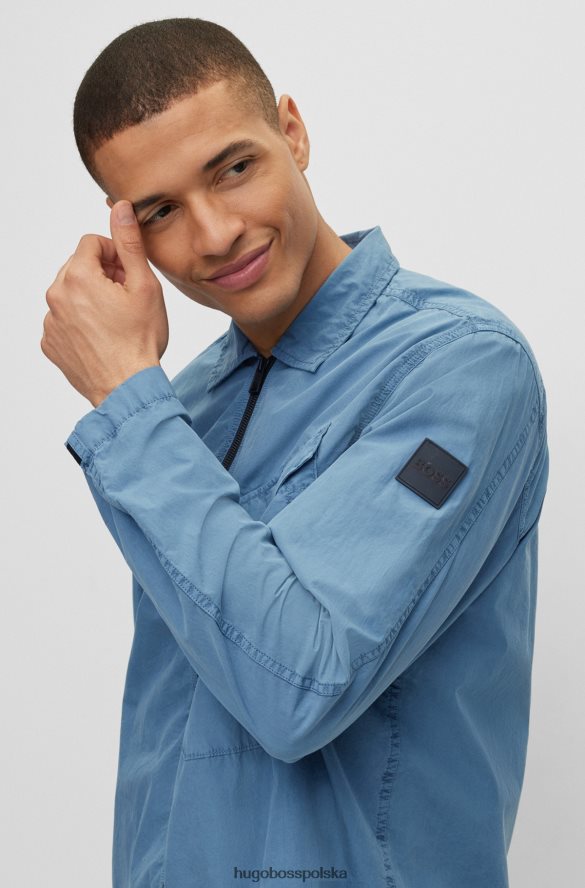 Hugo Boss niebieska bawełniana koszula oversize Hugo zapinana na zamek i kieszenią na piersi niebieski R0X0H62795