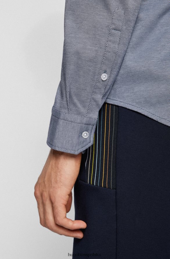 Hugo Boss niebieska koszulka dżersejowa o regularnym kroju z kołnierzykiem zapinanym na guziki hugo niebieski R0X0H64081