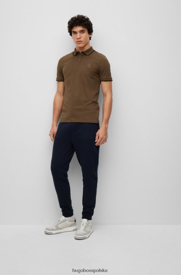 Hugo Boss Ciemnozielona koszulka polo o dopasowanym kroju hugo z elastycznej bawełny i naszywką z logo ciemnozielony R0X0H62881