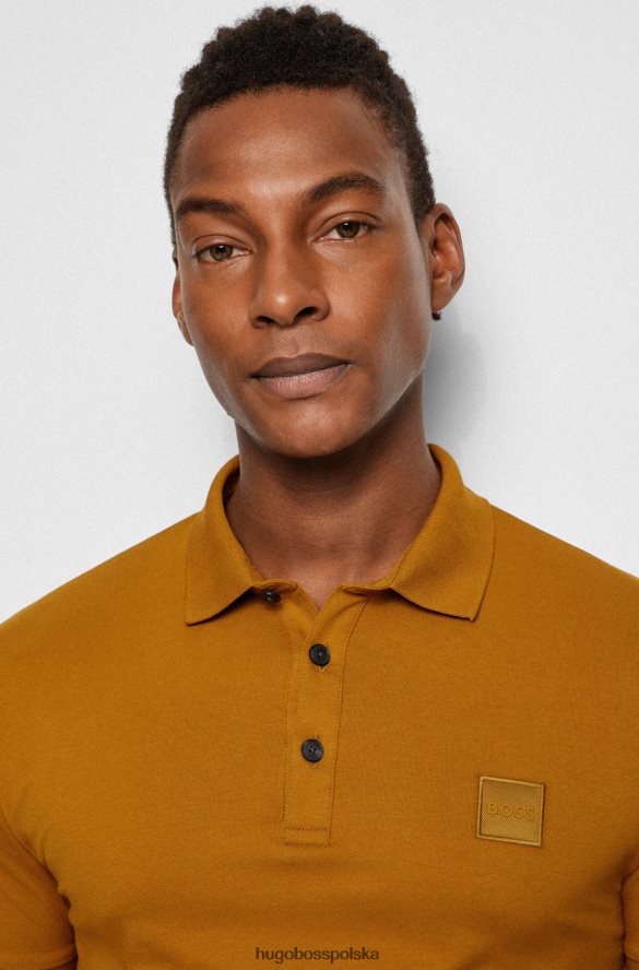 Hugo Boss beżowa koszulka polo Hugo z elastycznej bawełny, o dopasowanym kroju, z naszywką z logo beżowy R0X0H61623
