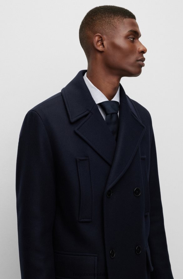 Hugo Boss dwurzędowy płaszcz o swobodnym kroju z mieszanki wełny hugo w kolorze ciemnoniebieskim ciemny niebieski R0X0H61321