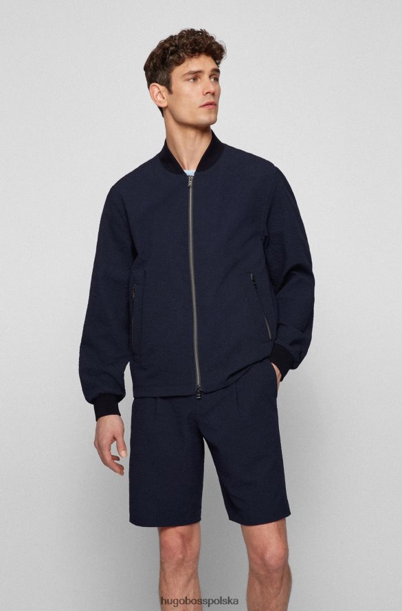 Hugo Boss ciemnoniebieska kurtka o dopasowanym kroju, wykonana z elastycznego materiału Seersucker Hugo ciemny niebieski R0X0H62057