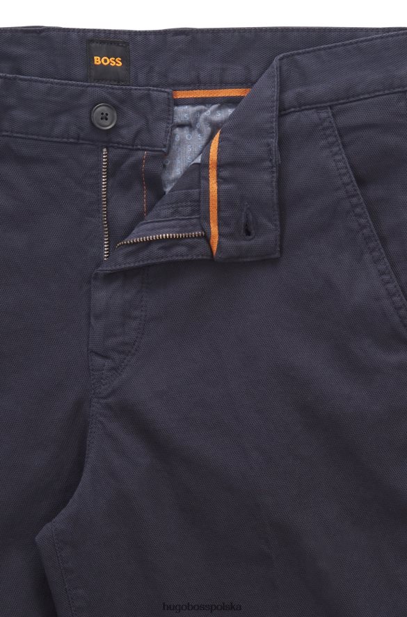 Hugo Boss Ciemnoniebieskie, zwężane szorty Hugo z tkaniny o strukturze plastra miodu z domieszką bawełny ciemny niebieski R0X0H64548