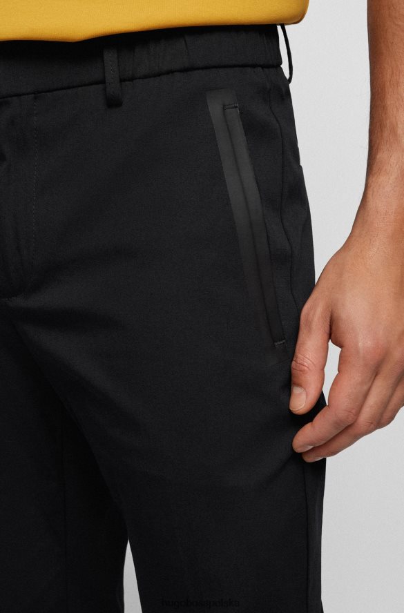 Hugo Boss Czarne, dopasowane spodnie Hugo z mieszanki bawełny Dobby czarny R0X0H62756