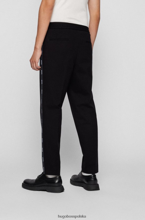 Hugo Boss Czarne spodnie hugo o swobodnym kroju z taśmą z logo czarny R0X0H64325