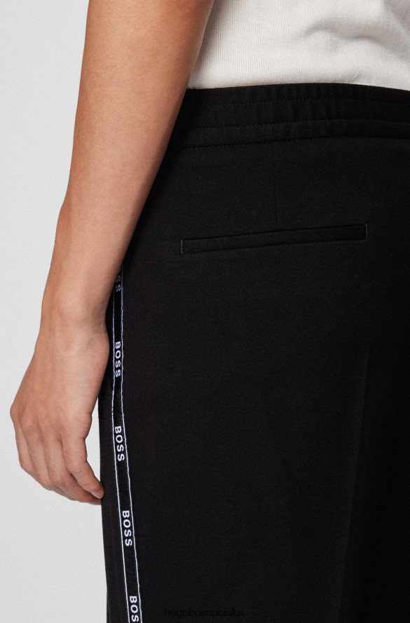 Hugo Boss Czarne spodnie hugo o swobodnym kroju z taśmą z logo czarny R0X0H64325