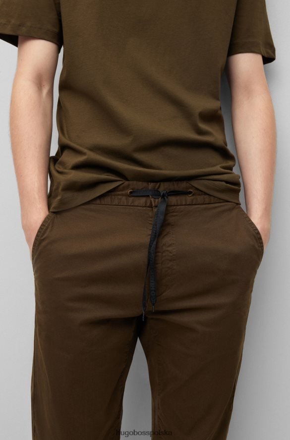 Hugo Boss Hugo Chinosy o wąskim kroju z mankietami i ciemnozieloną gabardyną z elastycznej bawełny ciemnozielony R0X0H62693
