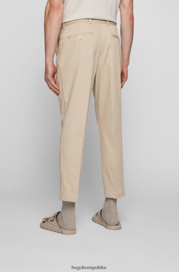 Hugo Boss Hugo jasnobeżowe, zwężane spodnie z elastycznej bawełny w mikrowzorzysty jasny beż R0X0H63617
