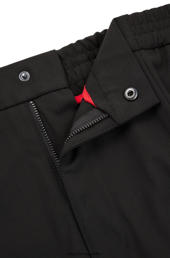 Hugo Boss Spodnie o dopasowanym kroju z mankietami, z elastycznego diagonalu hugo w kolorze czarnym czarny R0X0H63294