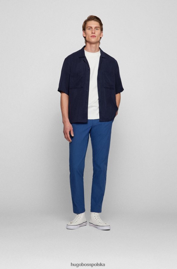 Hugo Boss Spodnie o dopasowanym kroju z zakładkami z przodu, z mieszanki bawełny w kolorze hugo blue niebieski R0X0H62554