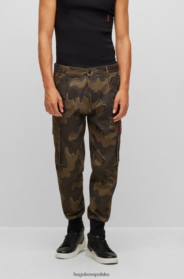 Hugo Boss Spodnie slim-fit z elastycznej bawełny w kamuflażu i wzorem hugo wzorzyste R0X0H64383