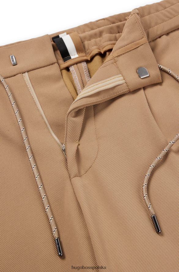 Hugo Boss Spodnie x FC Bayern o swobodnym kroju ze sznurkiem w charakterystyczne paski beżowy R0X0H64203