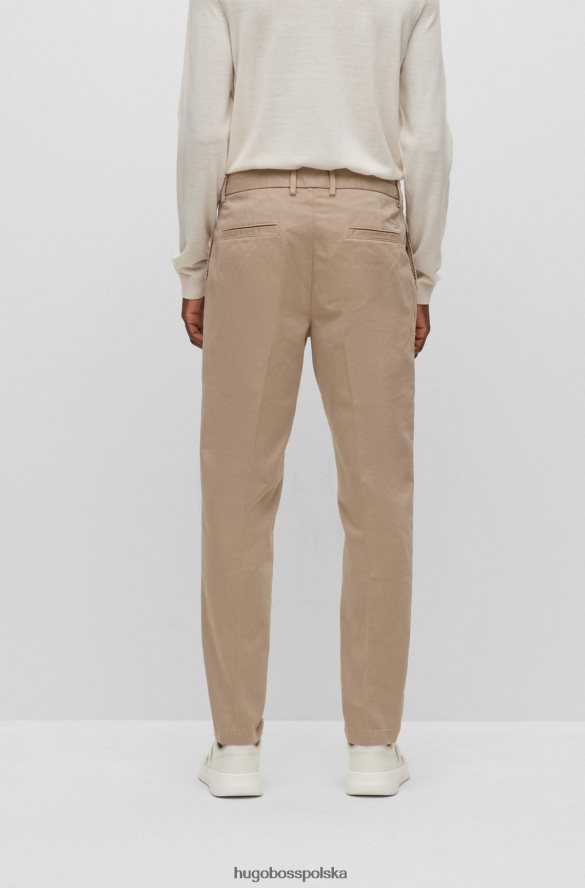 Hugo Boss Spodnie z zakładkami z elastycznej bawełny o diagonalnym splocie w kolorze jasnobeżowym hugo jasny beż R0X0H63872