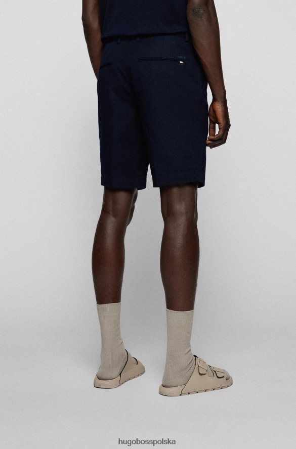 Hugo Boss Szorty o dopasowanym kroju ze strukturalnej, elastycznej bawełny Hugo w kolorze ciemnoniebieskim ciemny niebieski R0X0H63777