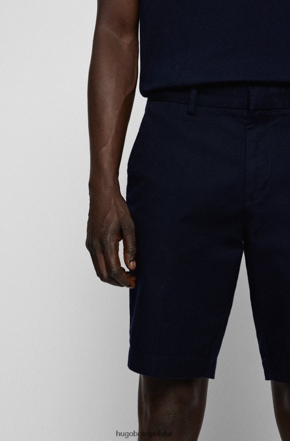 Hugo Boss Szorty o dopasowanym kroju ze strukturalnej, elastycznej bawełny Hugo w kolorze ciemnoniebieskim ciemny niebieski R0X0H63777