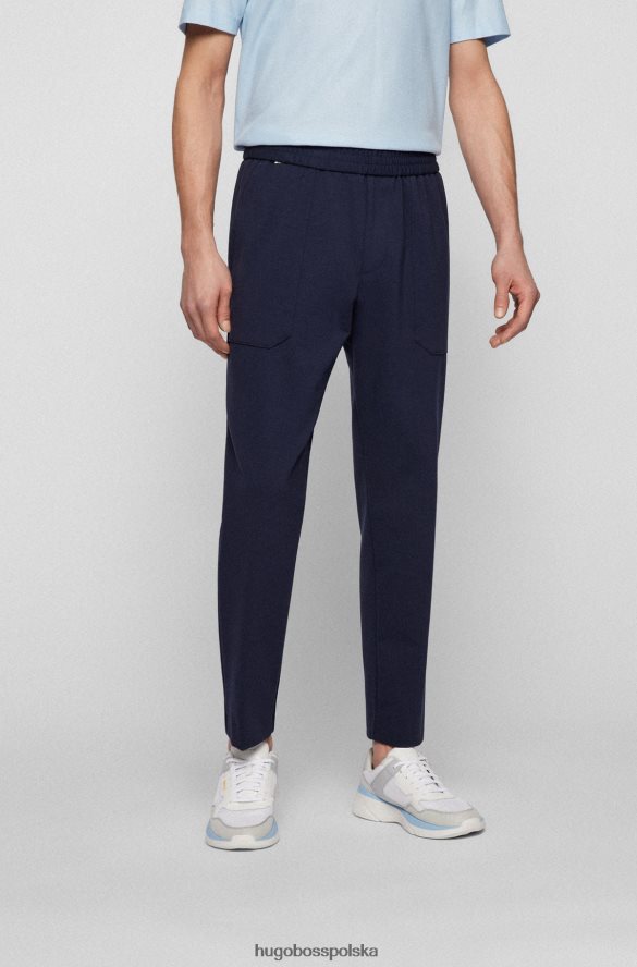 Hugo Boss Zwężane spodnie z elastycznego dżerseju w kolorze ciemnoniebieskim hugo ciemny niebieski R0X0H62074