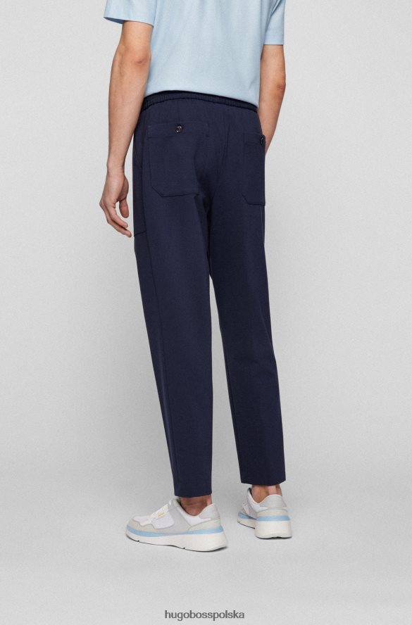 Hugo Boss Zwężane spodnie z elastycznego dżerseju w kolorze ciemnoniebieskim hugo ciemny niebieski R0X0H62074