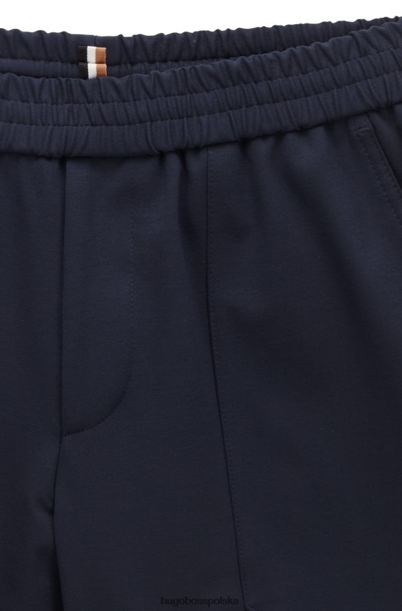Hugo Boss Zwężane spodnie z elastycznego dżerseju w kolorze ciemnoniebieskim hugo ciemny niebieski R0X0H62074