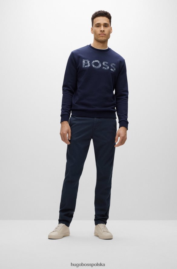 Hugo Boss Zwężane spodnie z mieszanki bawełny o strukturze plastra miodu hugo w kolorze ciemnoniebieskim ciemny niebieski R0X0H62305