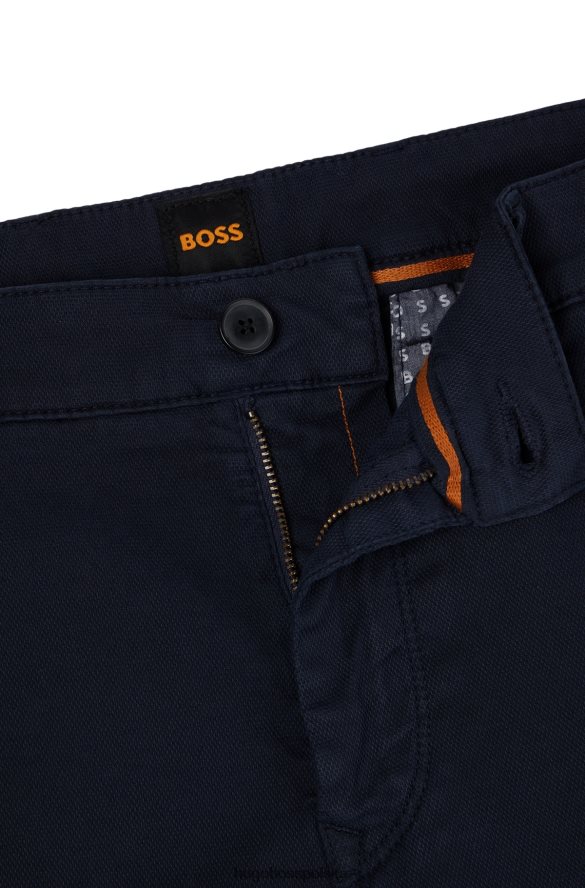 Hugo Boss Zwężane spodnie z mieszanki bawełny o strukturze plastra miodu hugo w kolorze ciemnoniebieskim ciemny niebieski R0X0H62305