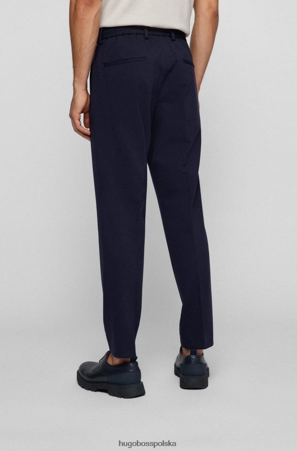 Hugo Boss ciemnoniebieskie spodnie Hugo o dopasowanym kroju z dżerseju interlock ze sznurkiem w pasie ciemny niebieski R0X0H62269