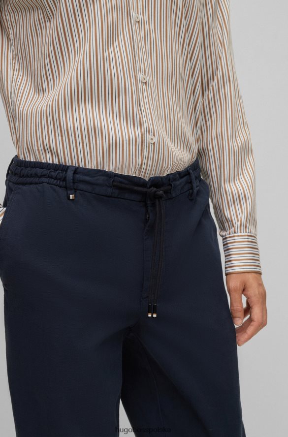 Hugo Boss ciemnoniebieskie spodnie o dopasowanym kroju ze strukturalnej mieszanki bawełny hugo ciemny niebieski R0X0H63503