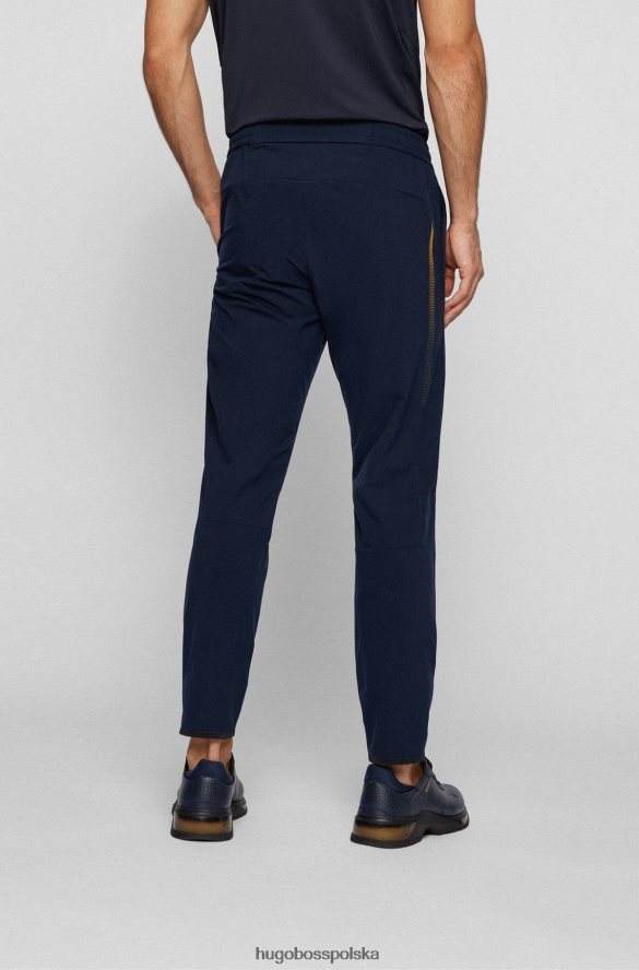 Hugo Boss ciemnoniebieskie spodnie slim-fit z elastycznego materiału softshell hugo ciemny niebieski R0X0H64515